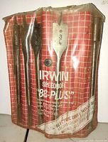 Front view of five Irwin SpeedBor 88-Plus spade bits in original plastic pouch