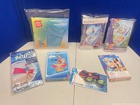 All six packaged pool accessories displayed