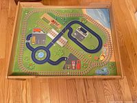 Top view showing printed play surface and raised frame