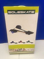 Front of box displaying SoleSkate clip-on wheel unit