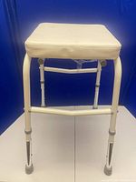 Front view of aluminum shower stool