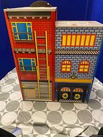 Front exterior view of wooden firehouse playset