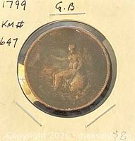 Reverse in holder showing seated Britannia