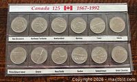 Full view of 12-coin set in plastic holder