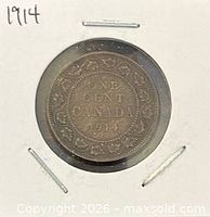Reverse side showing ONE CENT CANADA 1914 inside vine border