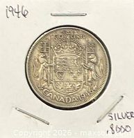 Coin in 2x2 holder, reverse side with Coat of Arms visible