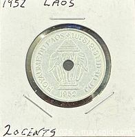 Obverse view showing elephant under parasol, date 1952