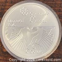 Reverse showing boxing scene and Montreal 1976 Olympic inscription on $10 silver coin