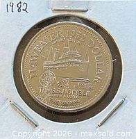 Obverse showing Haweater 1982 Dollar, S.S. Norisle, expiry date