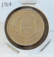Obverse of 1984 Kitchener-Waterloo Oktoberfest trade dollar in holder