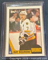 Front of 1987 O-Pee-Chee Ray Bourque hockey card in plastic sleeve