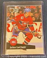 Front of 1991 Pro Set John LeClair rookie card in protective sleeve