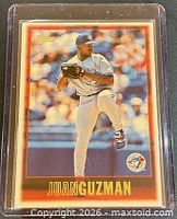 Front of 1997 Topps Juan Guzman baseball card in holder