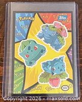 Front of 1999 Topps Pokémon sticker card showing Bulbasaur, Ivysaur, Venusaur artwork