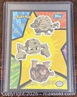Front of 1999 Topps Pokémon sticker card showing Geodude, Graveler and Golem