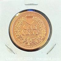 Reverse of copper round displaying wreath and ONE CENT legend