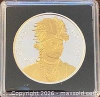 Reverse side showing gold-plated portrait of Chief Thayendanegea, CANADA DOLLAR legend, year 2007