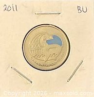 Reverse of coin showing colour Orca design and legend