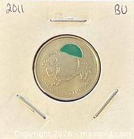 Reverse of coloured Wood Bison coin in holder