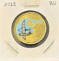 Reverse of 2022 Alexander Graham Bell colour loonie in holder
