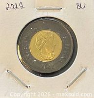 Obverse of 2022 colour toonie in holder