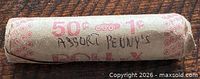 Side view of sealed Roll-X wrapper marked 50¢ 1¢ Assort Penny's
