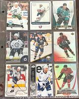 Front view of nine NHL trading cards in sleeve