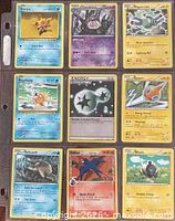 Front view of all nine Pokémon cards in binder sleeve