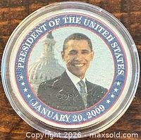 Obverse showing Obama portrait and inauguration date