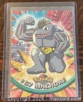 Front of Topps Pokémon card #67 Machoke in plastic holder