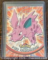 Front of Pokémon Topps card #33 Nidorino in sleeve
