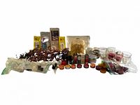 Full lot overview showing candles, holders, garlands, oils