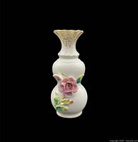Front view of double-gourd vase showing applied rose and scalloped rim