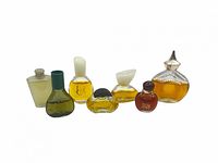 Front view of all seven miniature perfume bottles