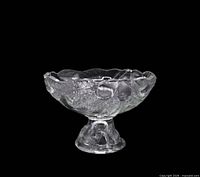 Overall view of clear crystal footed bowl showing pedestal and decorative relief