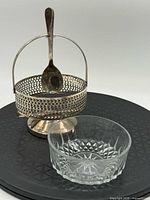 Basket and glass bowl displayed side by side