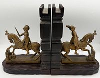 Front view of both bookends aligned showing knights and castle crenellations