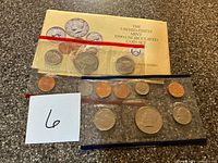 Full view of envelope with both sealed sleeves of coins displayed