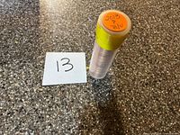 Tube roll labeled 2013 P BU beside lot card
