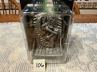 Front view of sealed Alien wall relief in clamshell