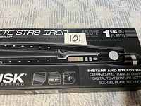 Closed retail box front showing product image, model and brand