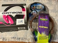 All three headphone packages showing fronts