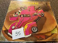 Front cover of The Mothers LP showing artwork and lot sticker 35