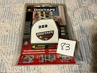 Front view of sealed Starrett Digitape package
