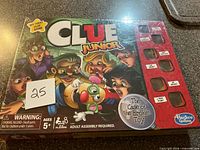 Front of sealed Clue Junior game box