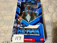 Front view of sealed Stratos figure package