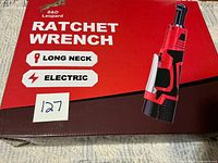 Front of sealed box showing product image and branding