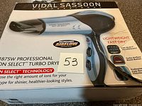 Front of retail box showing model details and wattage