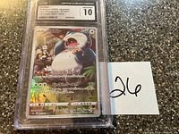 Full view of CGC-slabbed Snorlax card with handwritten lot number
