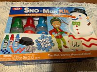 Front of Ideal Sno-Man Kit box showing contents and graphics